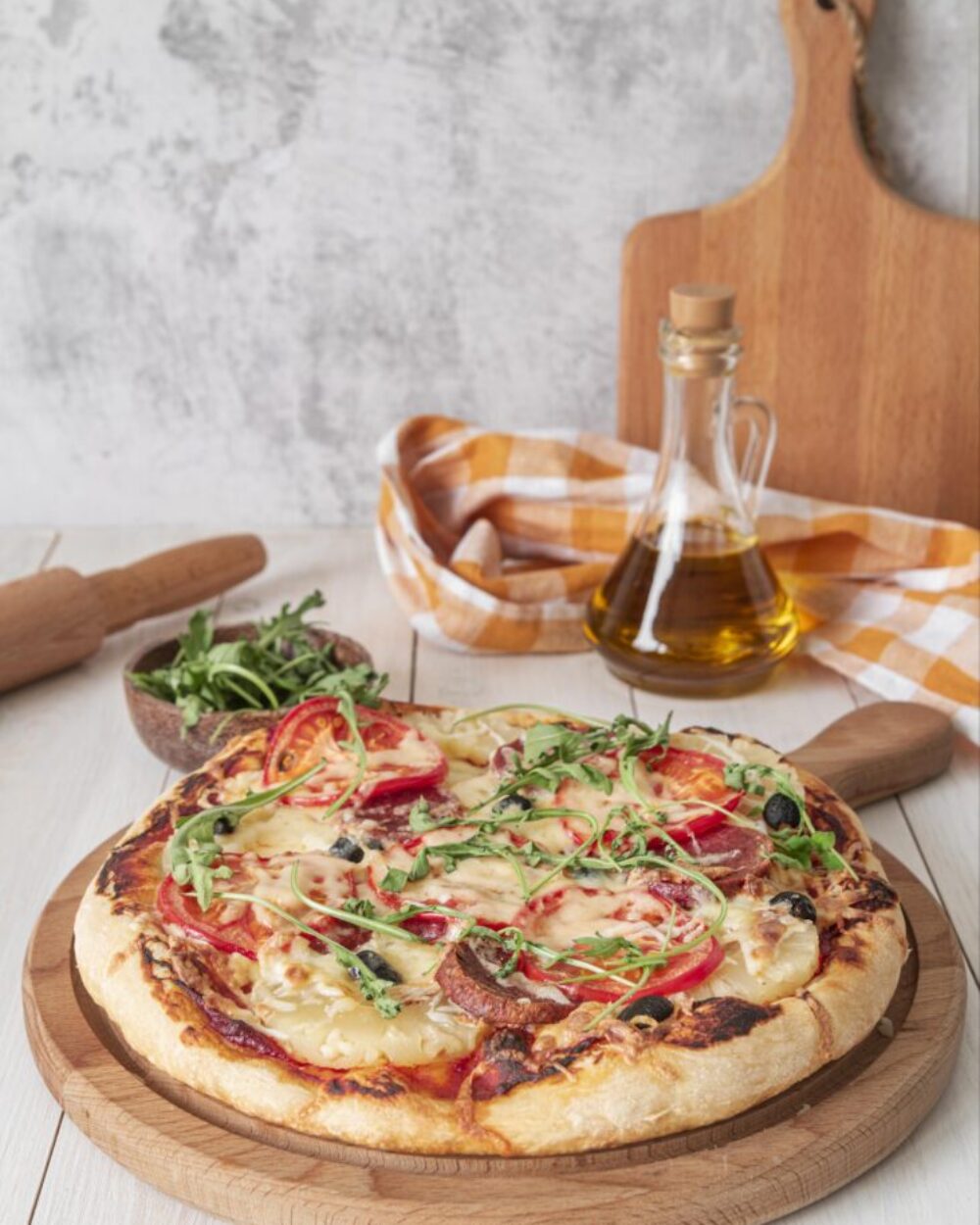 Tuacany Pizza brings the perfect balance of creamy white sauce and fresh toppings. Every bite is a burst of rich, savory flavor.